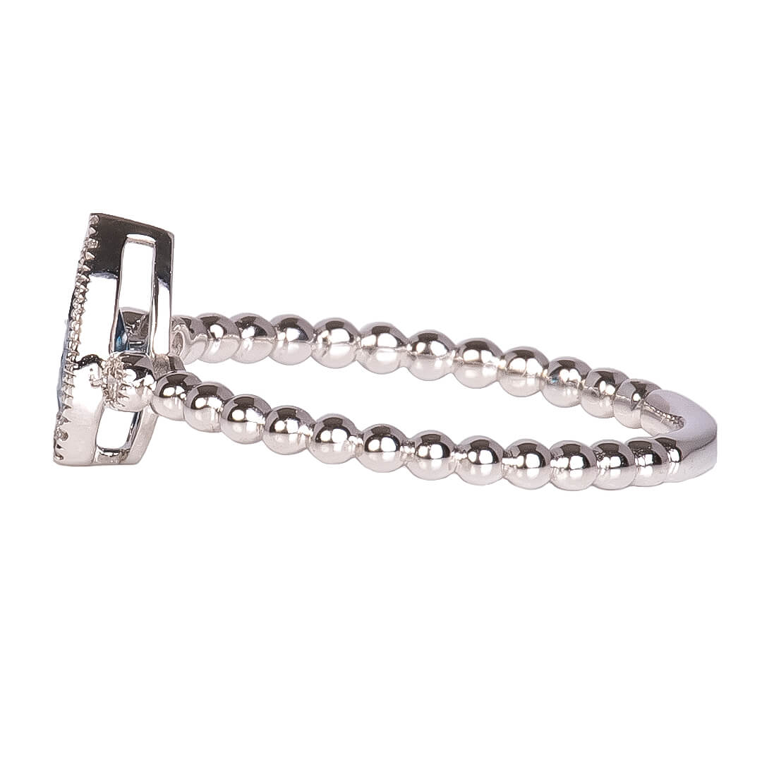 Anillo con Topacio London Blue Corte Pera y Diamantes 0.07qts con Brazos Bolitas
