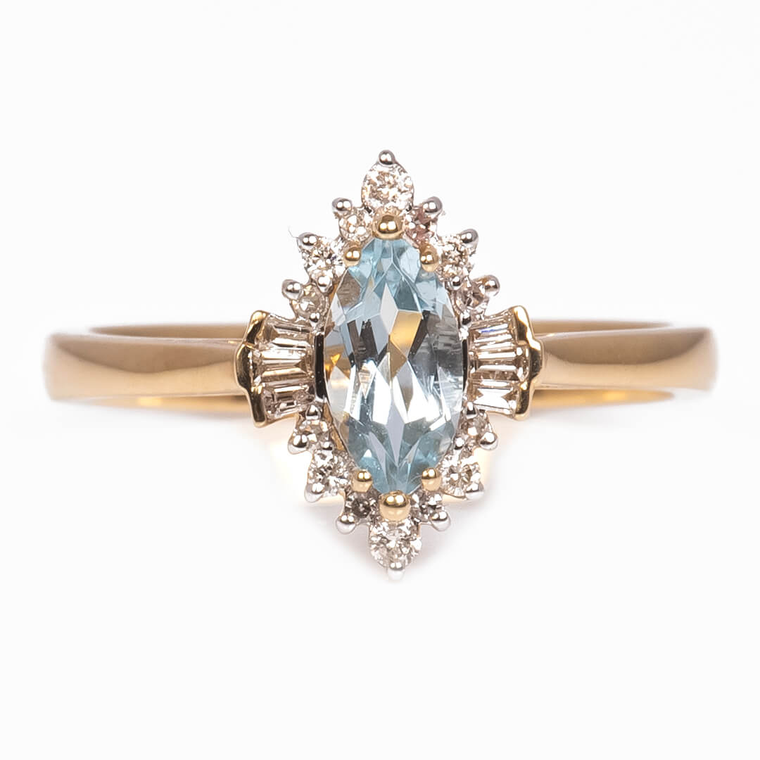 Anillo con Aguamarina Corte Marquise 0.55qts con Diamantes Naturales 0.15qts