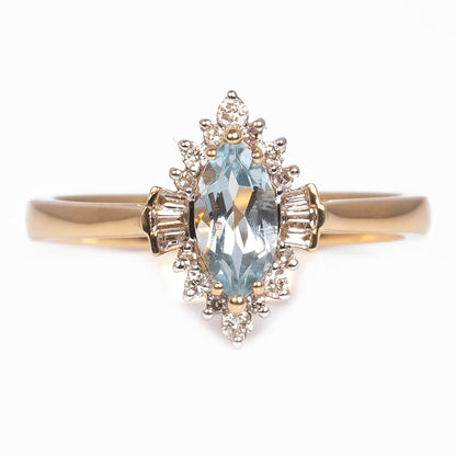 Anillo con Aguamarina Corte Marquise 0.55qts con Diamantes Naturales 0.15qts