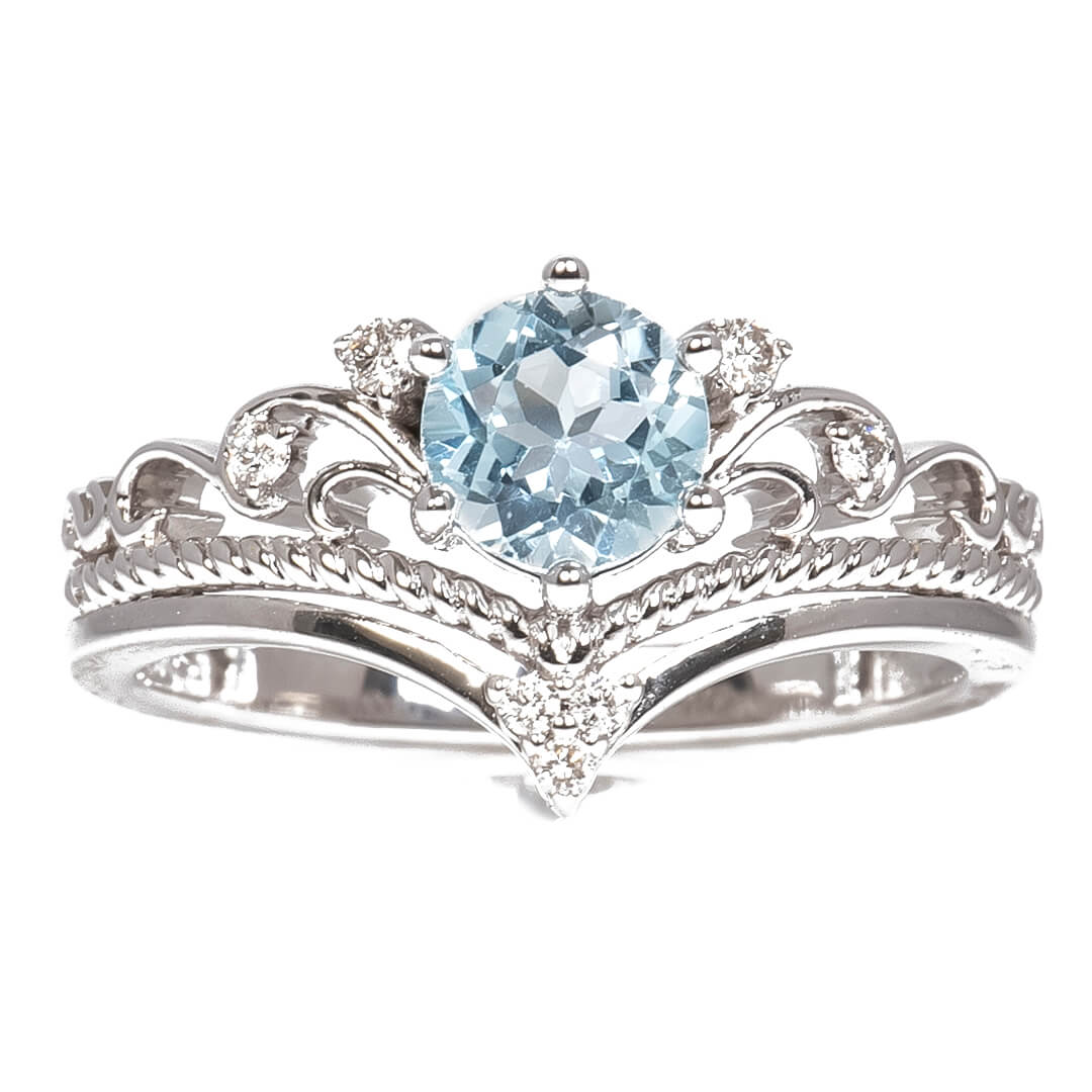 Anillo con Aguamarina Corte Redondo 1.25qts y Diamantes Naturales 0.08qts