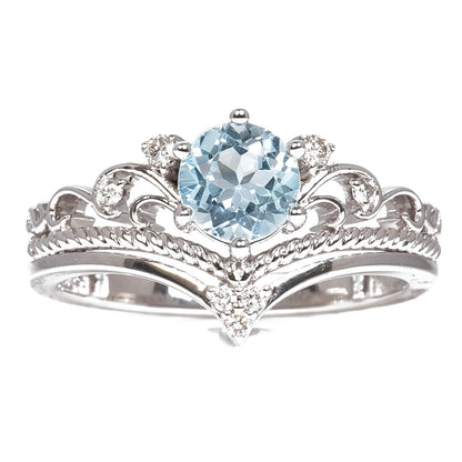 Anillo con Aguamarina Corte Redondo 1.25qts y Diamantes Naturales 0.08qts