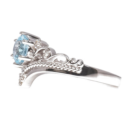 Anillo con Aguamarina Corte Redondo 1.25qts y Diamantes Naturales 0.08qts