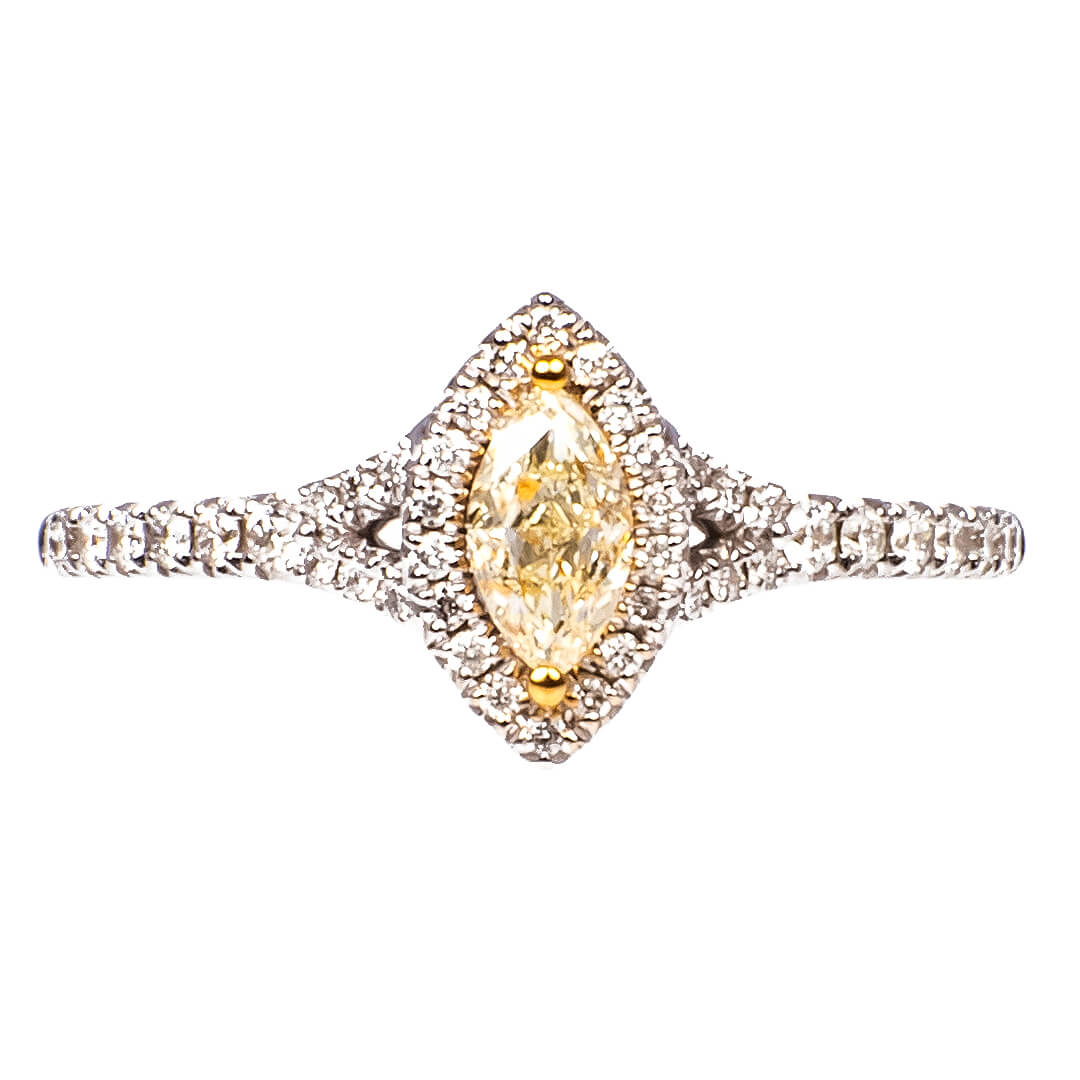 Anillo con Diamante Amarillo Marquise y Halo de Diamantes Naturales