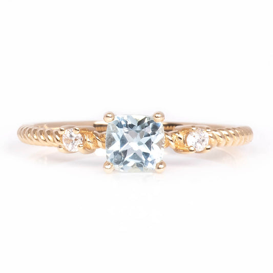 Anillo con Topacio Azul con Circones y Brazo Trenzado