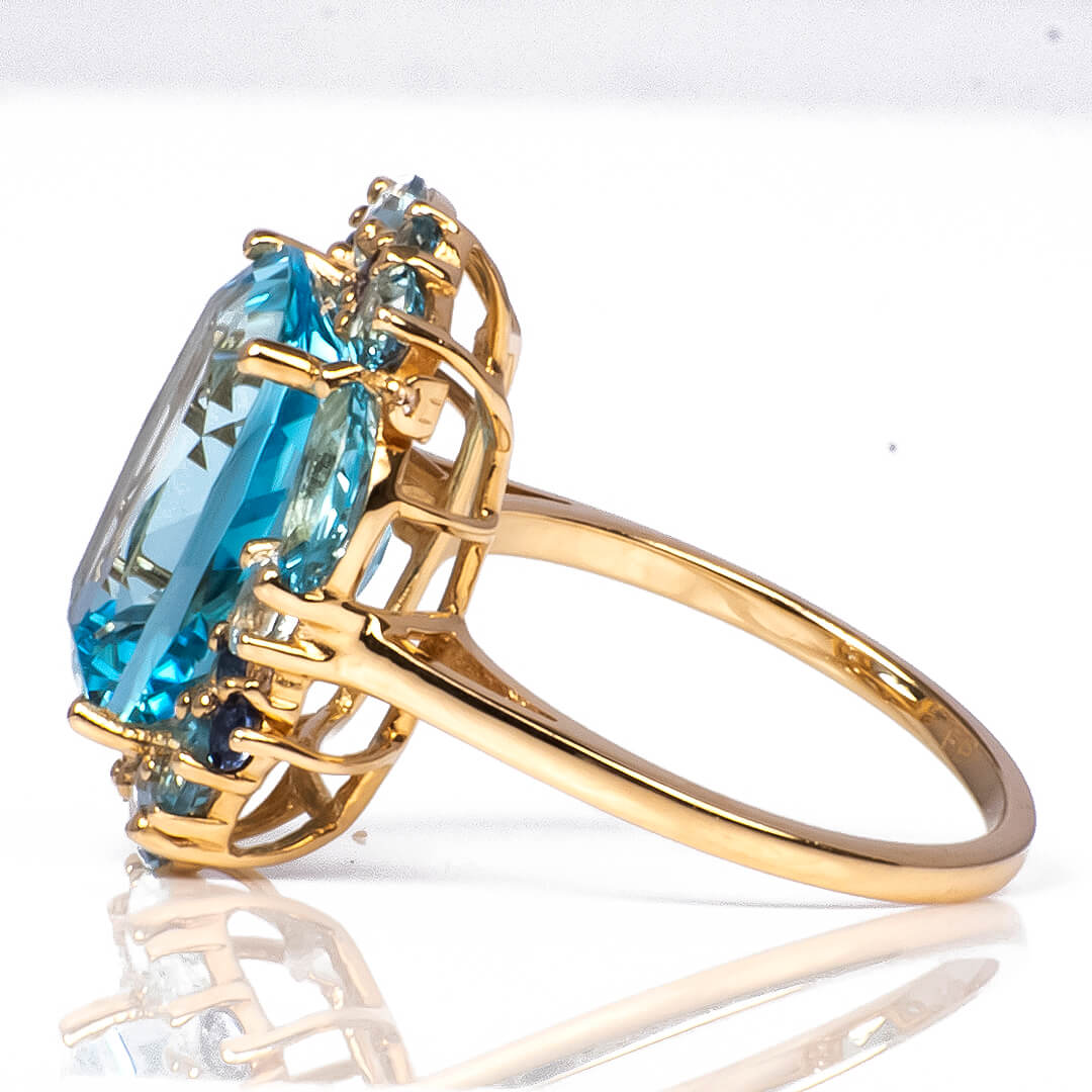 Anillo con Topacio Central con Halo de Aguamarinas y Diamantes Nat