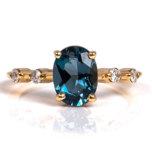 Anillo con Topacio London Blue 14k