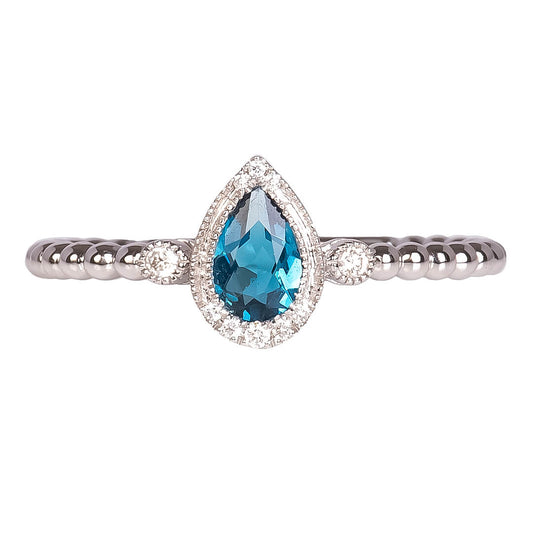 Anillo con Topacio London Blue Corte Pera y Diamantes 0.07qts con Brazos Bolitas