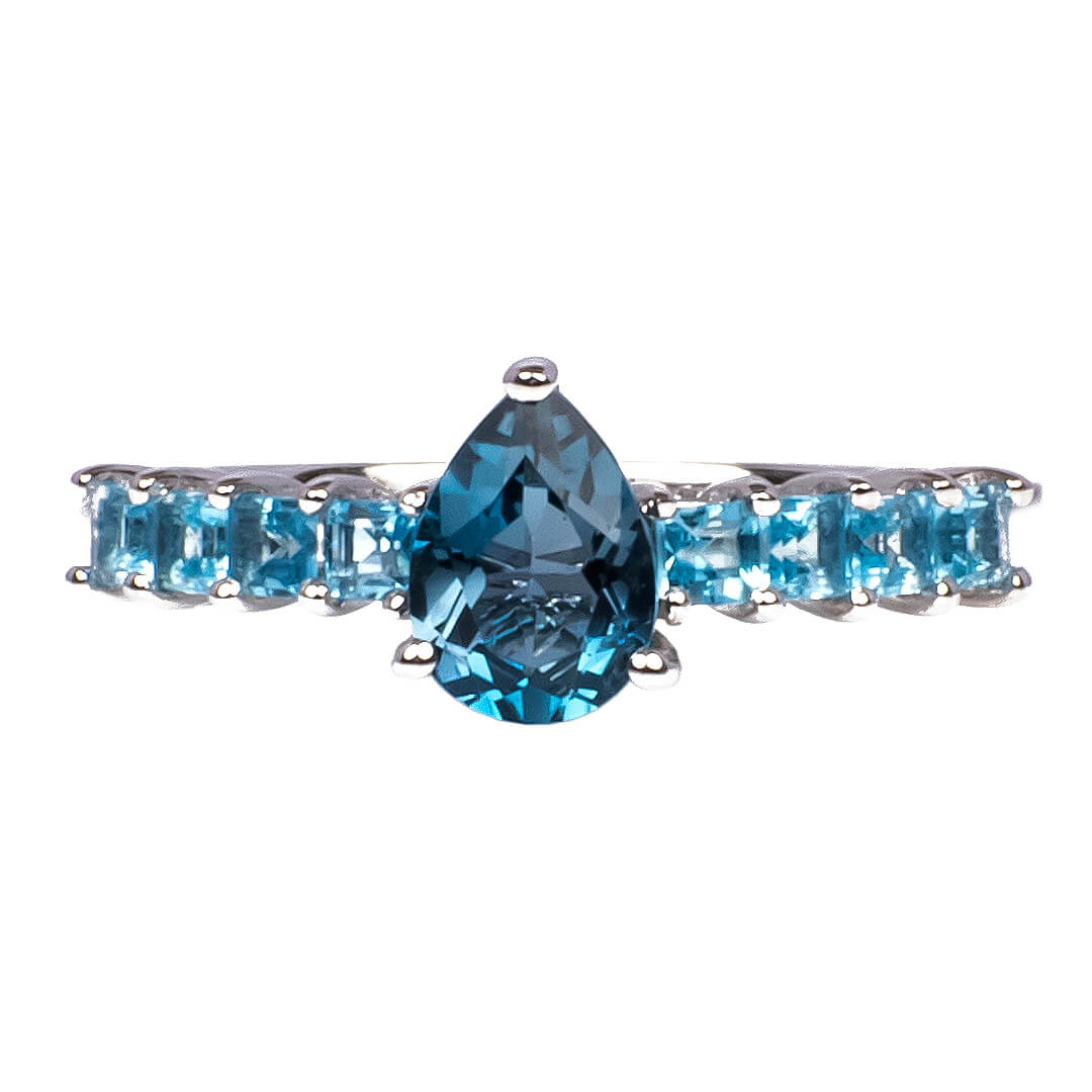 Anillo Topacio Azul con Corte Pera Central