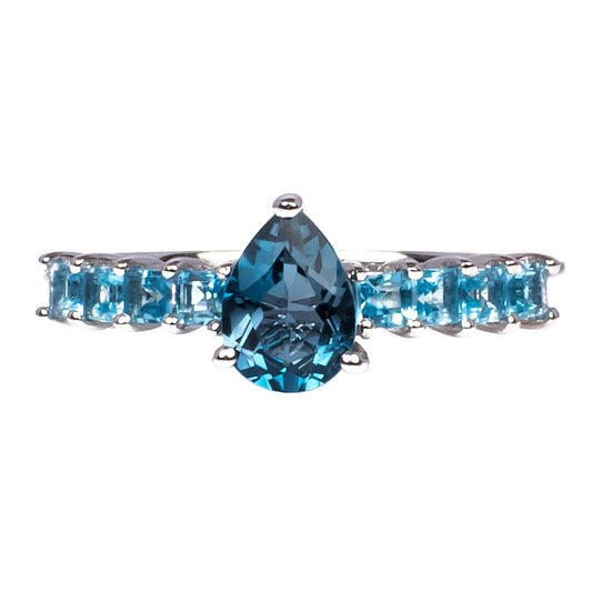 Anillo Topacio Azul con Corte Pera Central