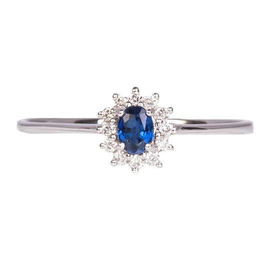 Anillo tipo Diana con Zafiro Oval 0.20qts y Diamantes Naturales 0.10qts