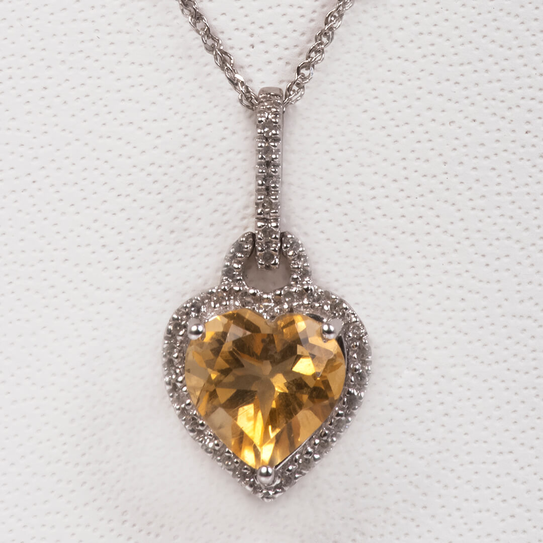 Dije de Citrina Corazón 2.33qts con Halo de Diamantea Naturales 0.12qts