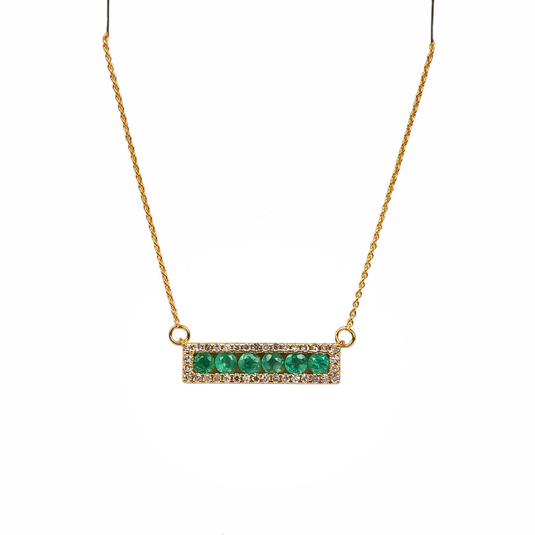 Dije con Esmeraldas Naturales 0.30qts y Diamantes Nat 0.15qts y Cadena