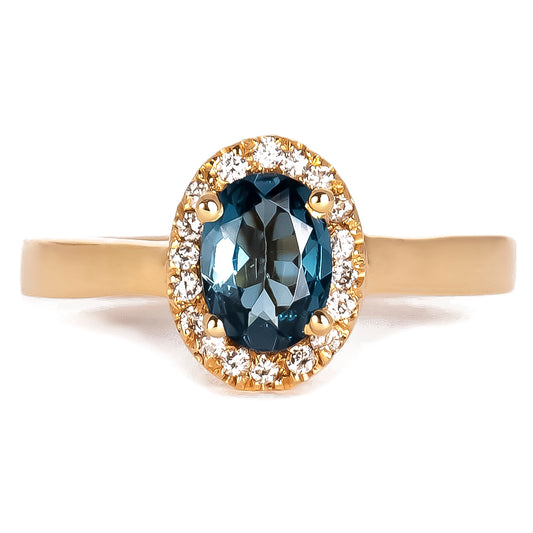 Anillo Lana con "London Blue Topaz" oval con Diamante laterales